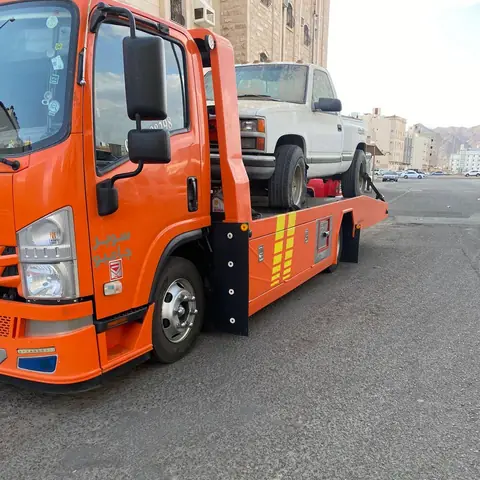 فريق سطحة المدينة المنورة أثناء العمل